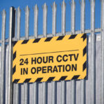 CCTV in operation 24 hours premises protected sign uk